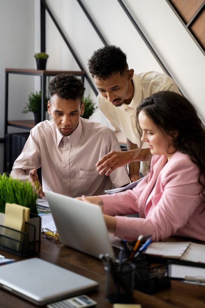 girl and boys are working in office girl and boys are working in office
